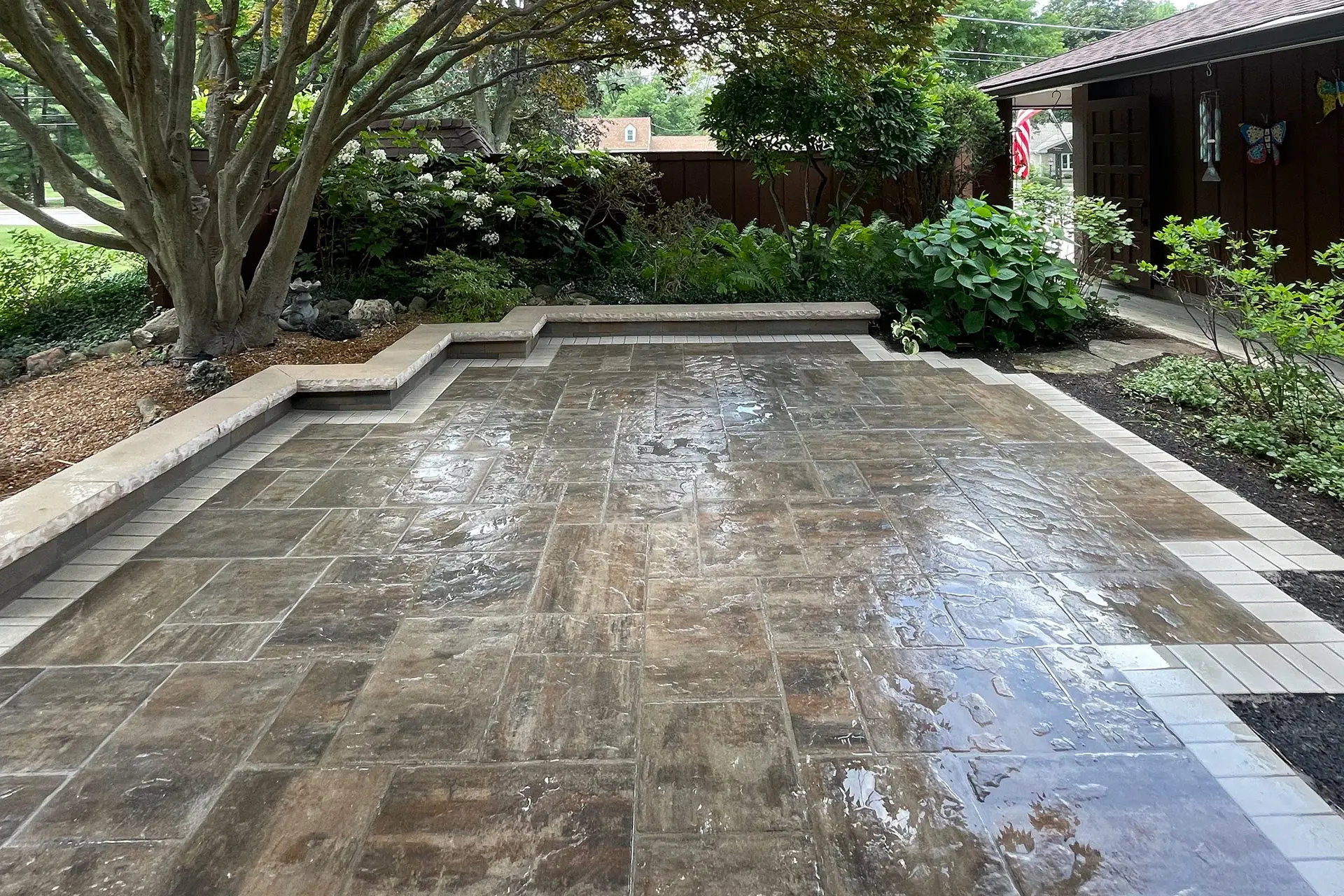 the-wet-patio-with-a-trees-and-a-house